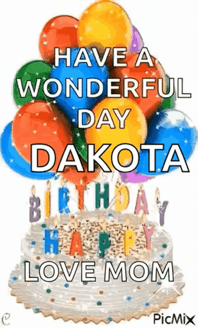 A Birthday Cake With Balloons And Candles On It . GIF
