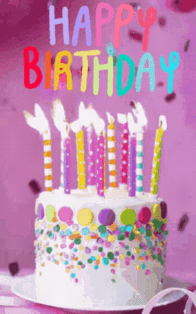 A Birthday Cake With Candles And Sprinkles And The Words Happy Birthday On It GIF