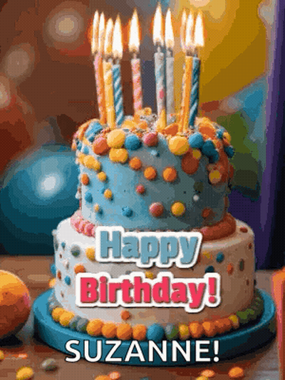 A Birthday Cake With Candles And The Words Happy Birthday Suzanne On It GIF