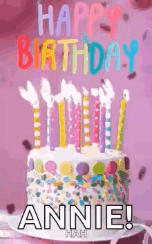 A Birthday Cake With Candles On It And The Words `` Happy Birthday Annie ! `` GIF