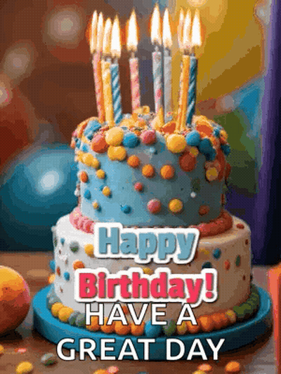 A Birthday Cake With Candles On It And The Words `` Happy Birthday Have A Great Day '' GIF