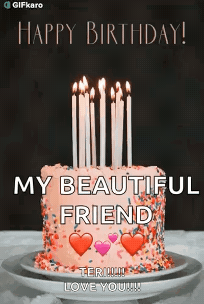 A Birthday Cake With Candles On It Is On A Plate On A Table . GIF