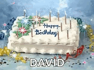 A Birthday Cake With Candles On It That Says Happy Birthday David GIF