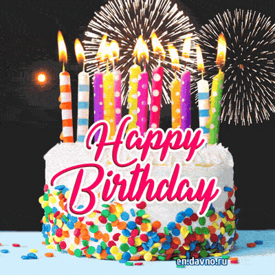 A Birthday Cake With Fireworks In The Background And The Words Happy Birthday GIF