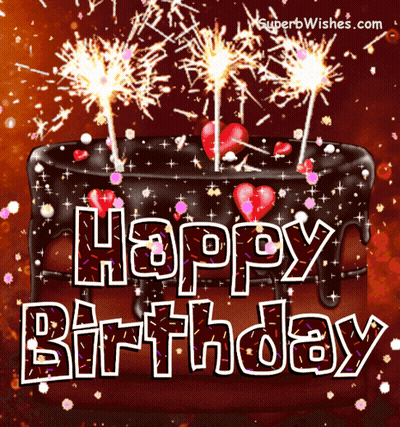 A Birthday Cake With Sparklers And The Words Happy Birthday Written On It GIF