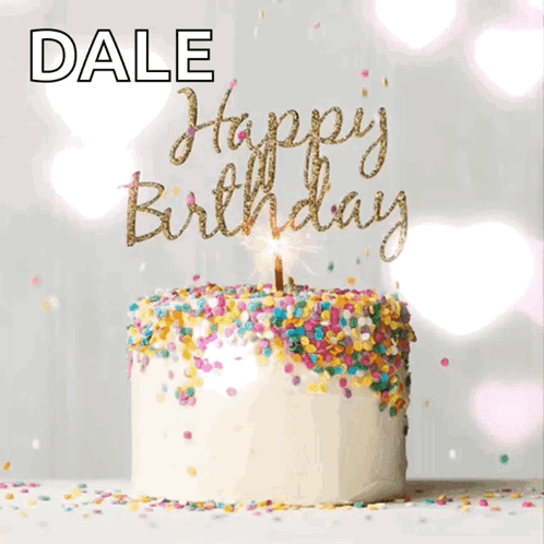 A Birthday Cake With Sprinkles And A Lit Candle That Says Happy Birthday GIF