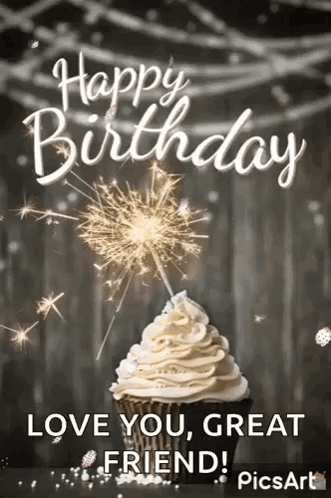 A Birthday Card With A Cupcake And A Sparkler . GIF