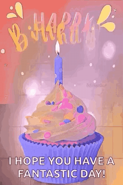 A Birthday Cupcake With A Candle On Top Of It . GIF