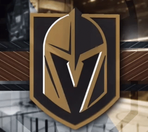A Black And Gold Shield With A Helmet On It GIF