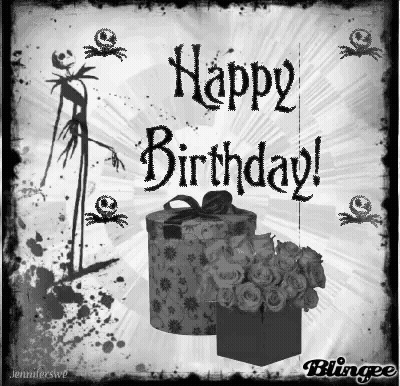 A Black And White Birthday Card With A Gift Box And Flowers GIF