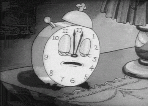A Black And White Cartoon Clock With A Face On It GIF