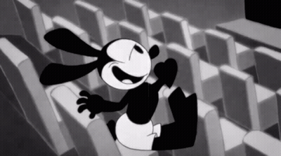 A Black And White Cartoon Of A Rabbit Sitting On A Row Of Seats GIF