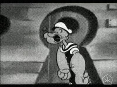 A Black And White Cartoon Of Popeye The Sailor Is Standing In Front Of A Large Keyhole . GIF