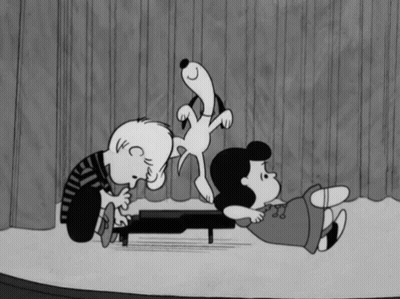 A Black And White Cartoon Of Snoopy And Lucy Playing Piano GIF