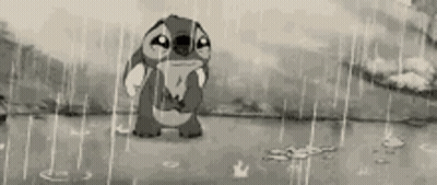 A Black And White Cartoon Of Stitch Crying In The Rain GIF
