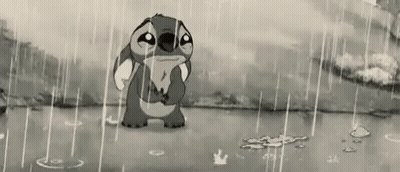 A Black And White Cartoon Of Stitch Standing In The Rain Holding A Fish . GIF