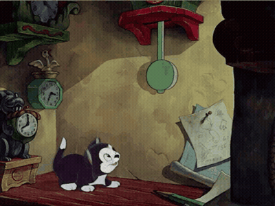 A Black And White Cat Is Looking At A Clock That Shows The Time As 7:15 GIF