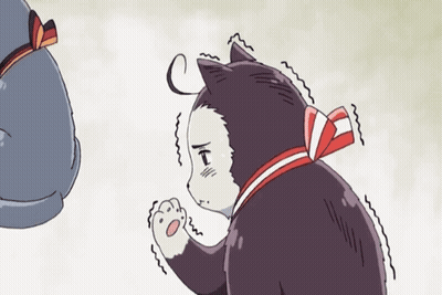A Black And White Cat With A Red Bow Around Its Neck Is Standing Next To Another Cat GIF