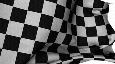 A Black And White Checkered Flag Is Being Blown In The Wind GIF