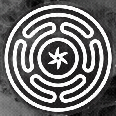 A Black And White Circular Symbol With A Star In The Center GIF