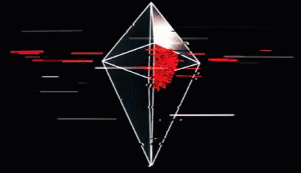 A Black And White Diamond With A Red Center GIF