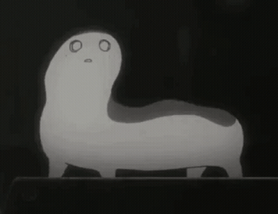 A Black And White Drawing Of A Cat With A Surprised Look On Its Face . GIF