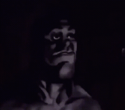 A Black And White Drawing Of A Man With A Serious Expression On His Face GIF