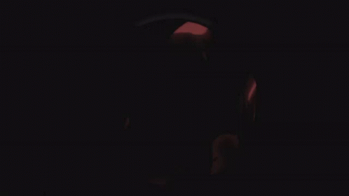 A Black And White Drawing Of A Person Covering Their Face With A Hand . GIF