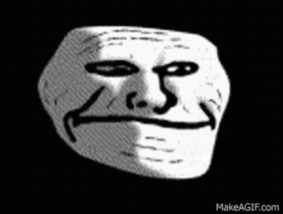 A Black And White Drawing Of A Troll Face With A Big Smile . GIF