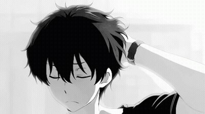 A Black And White Image Of A Boy With His Eyes Closed GIF
