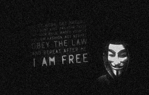A Black And White Image Of A Man In A Mask With A Quote That Says I Am Free GIF
