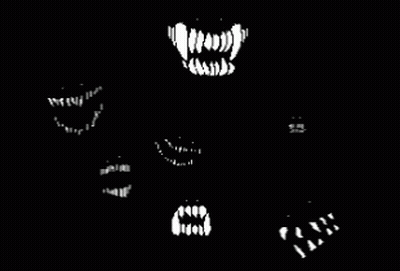 A Black And White Image Of A Monster 'S Mouth With Fangs GIF