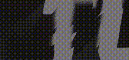A Black And White Image Of A Person 'S Face With The Letters U And G Visible GIF