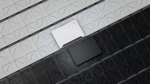 A Black And White Item On A Black And White Grid GIF