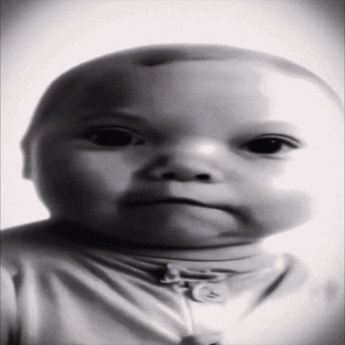 Black And White Baby In White Sweater GIF