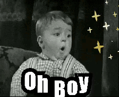 A Black And White Photo Of A Baby With The Words Oh Boy GIF