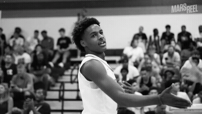 A Black And White Photo Of A Basketball Player With The Word Mars Reel On The Bottom Left GIF