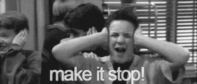 A Black And White Photo Of A Boy Covering His Ears With His Hands And The Words `` Make It Stop ! '' GIF