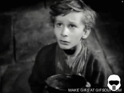 A Black And White Photo Of A Boy Holding A Cup With The Words Make Gifs At Gifsoun.com Below Him GIF