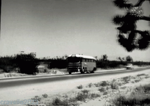 A Black And White Photo Of A Bus On A Highway With The Watermark Cravelle205 GIF
