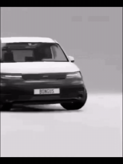 A Black And White Photo Of A Car With A License Plate That Says Bongus GIF