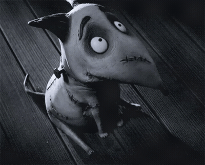 A Black And White Photo Of A Cartoon Dog With Stitches On His Face GIF