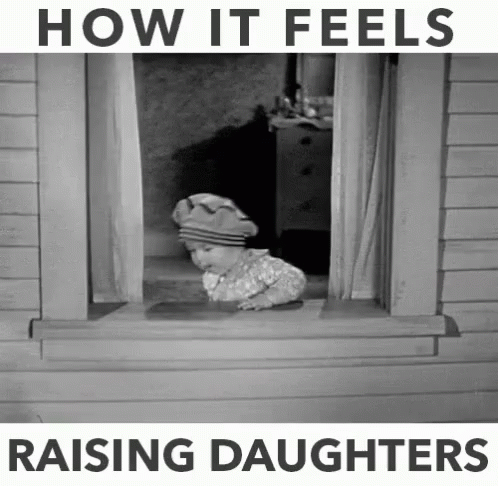 A Black And White Photo Of A Child Looking Out A Window With The Words How It Feels Raising Daughters GIF
