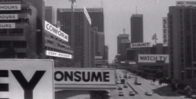 A Black And White Photo Of A City With Signs That Say Conform Stay Asleep And Consume GIF