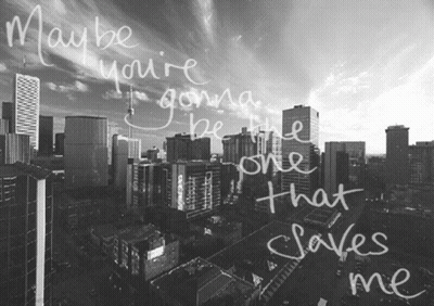 A Black And White Photo Of A City With The Words Maybe You 'Re Gonna Be The One That Saves Me Written On It GIF
