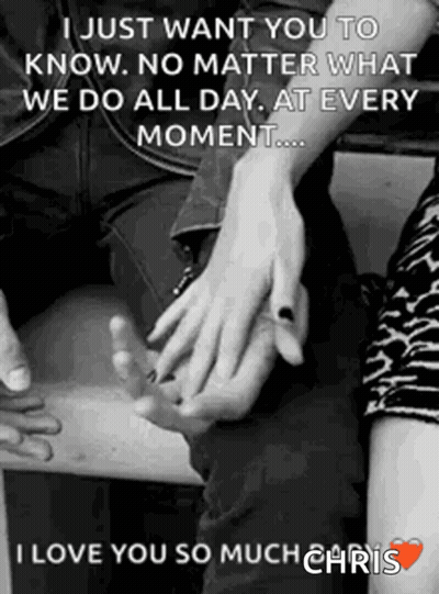 A Black And White Photo Of A Couple Holding Hands GIF