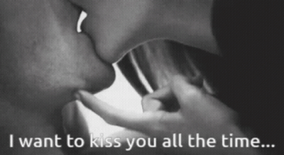 A Black And White Photo Of A Couple Kissing With The Words " I Want To Kiss You All The Time " GIF