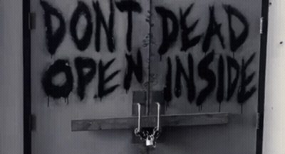 A Black And White Photo Of A Door With The Words Do N't Dead Open Inside Spray Painted On It GIF