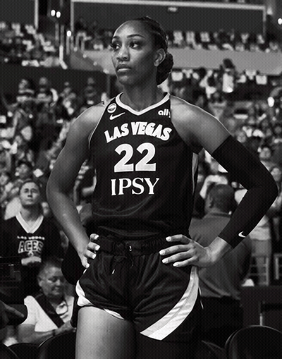 A Black And White Photo Of A Female Basketball Player Wearing A Las Vegas 22 Jersey GIF