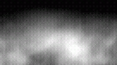 A Black And White Photo Of A Foggy Sky GIF